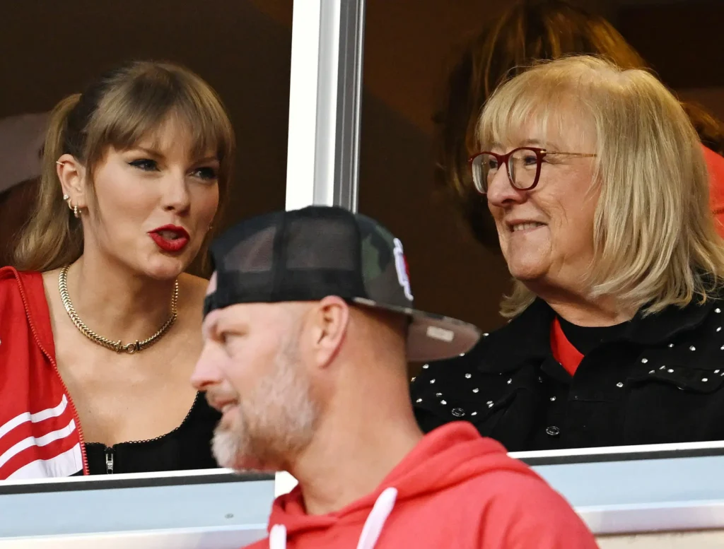 Taylor Swift, left, and Donna Kelce, mother of Chiefs tight end Travis Kelce get ready to watched the game at GEHA Field at Arrowhead Stadium on October 12, 2023